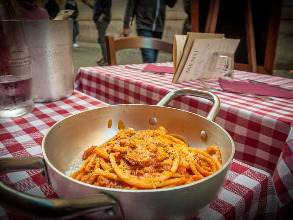 ITS__0007_Delicious plate of pasta with amatriciana sauce, in Trastevere