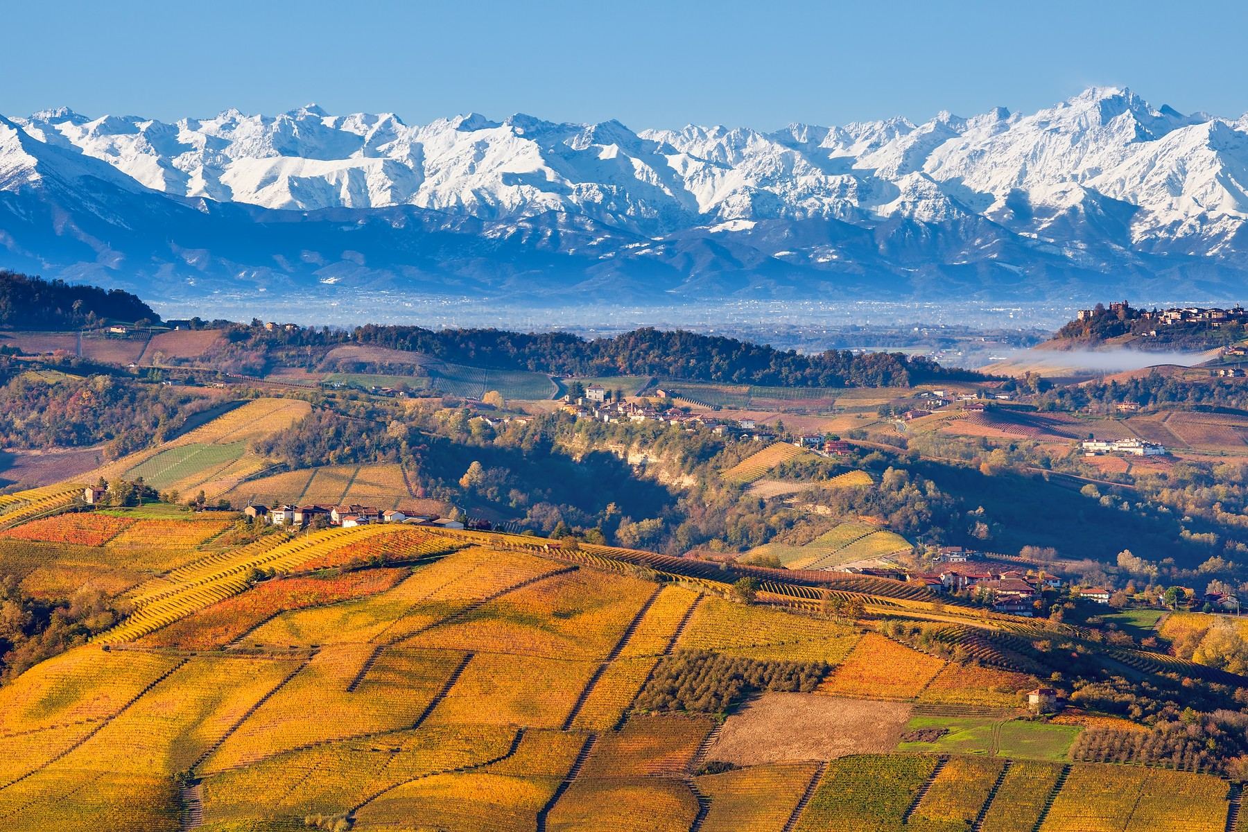 Autumnal Hills And Snowy Mountains In Piedmont — Langhe and Sardinia tour by Italy Travel Specialist