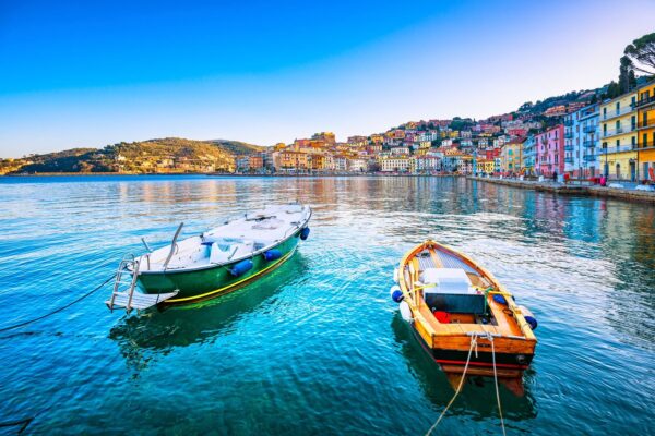 Wooden Small Boats In Porto Santo Stefano Seafront — Tuscany grand journey by Italy Travel Specialist